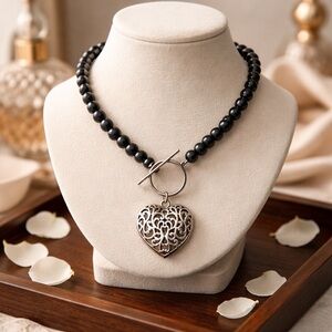 Elegant Black Beaded Necklace with Silver Heart Pendant
